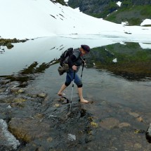 Crossing a stream with icy water
